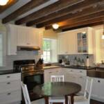  Renovated Kitchen with original beams exposed.